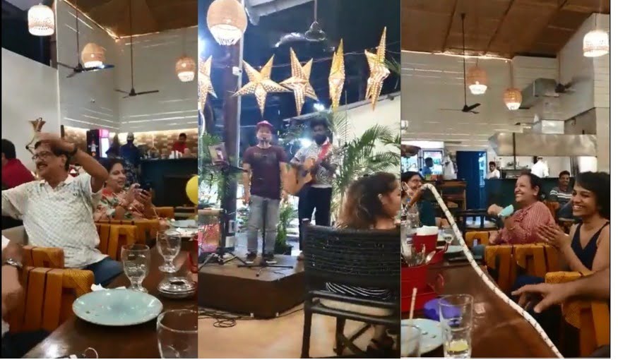 people are enjoying old advertisement instead of songs at restaurant.