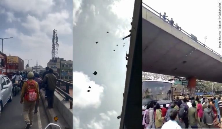It’s raining money in Bengaluru-Man throws bundle of cash It's raining money in Bengaluru: Man throws bundle of cash