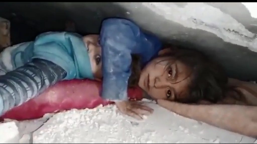 Turkey-Video of little girl shielding sibling under debris melting