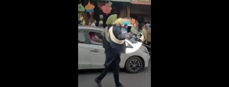 Watch: Man brandishes pistol to control traffic in Punjab's Amritsar