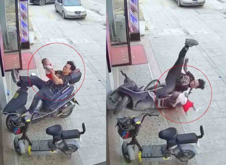 Viral video of FAther falling from scooter and saving infant