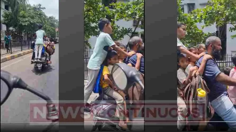 Mumbai News : 8 kids going to school on one scooter, video goes viral Mumbai News : 8 kids going to school on one scooter, video goes viral