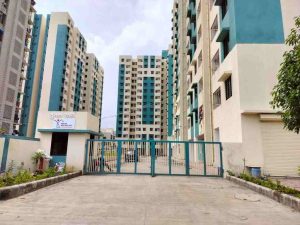 Finance Minister Kanubhai Desai inaugurating 1060 EWS flats and computerized draw of 1498 flats under 'PM Awas Yojana