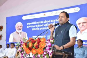 Finance Minister Kanubhai Desai inaugurating 1060 EWS flats and computerized draw of 1498 flats under 'PM Awas Yojana