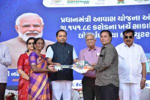 Finance Minister Kanubhai Desai inaugurating 1060 EWS flats and computerized draw of 1498 flats under 'PM Awas Yojana