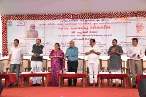 Finance Minister Kanubhai Desai inaugurating 1,611 state-of-the-art facilities under 'Mukhyamantri Griha Yojana' at a cost of Rs.131.84 crore at Jahangirabad and Pandesara in the city.