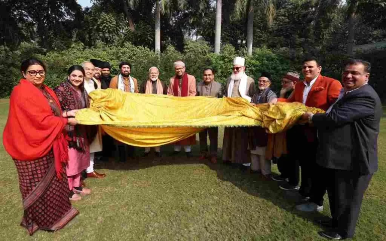 PM Narendra Modi presents sacred Chadar to be placed during the Urs of Khwaja Moinuddin Chishti at Ajmer Sharif Dargah PM Narendra Modi presents sacred Chadar to be placed during the Urs of Khwaja Moinuddin Chishti at Ajmer Sharif Dargah