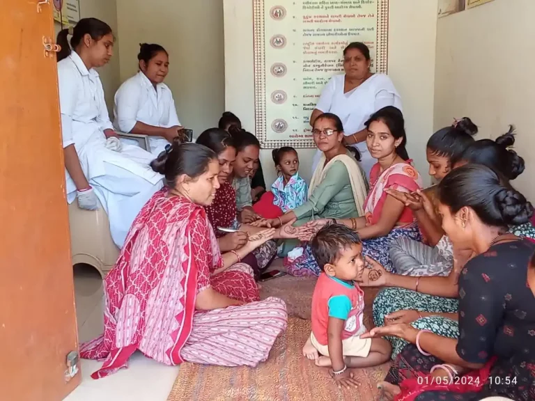 Mass henna programs were held to sensitize women voters at sub-centres, Anganwadi centers of Mangarol taluka of Surat district