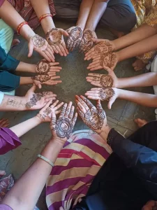 Mass henna programs were held to sensitize women voters at sub-centres, Anganwadi centers of Mangarol taluka of Surat district