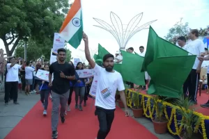 'Run for Vote' program held at Sabarmati Riverfront for voting awareness in Ahmedabad district.