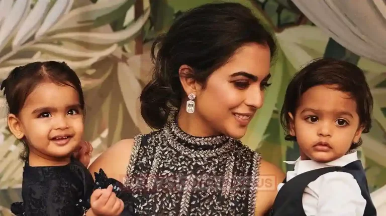 isha ambani latest pic with toy twin babies isha ambani latest pic with toy twin babies