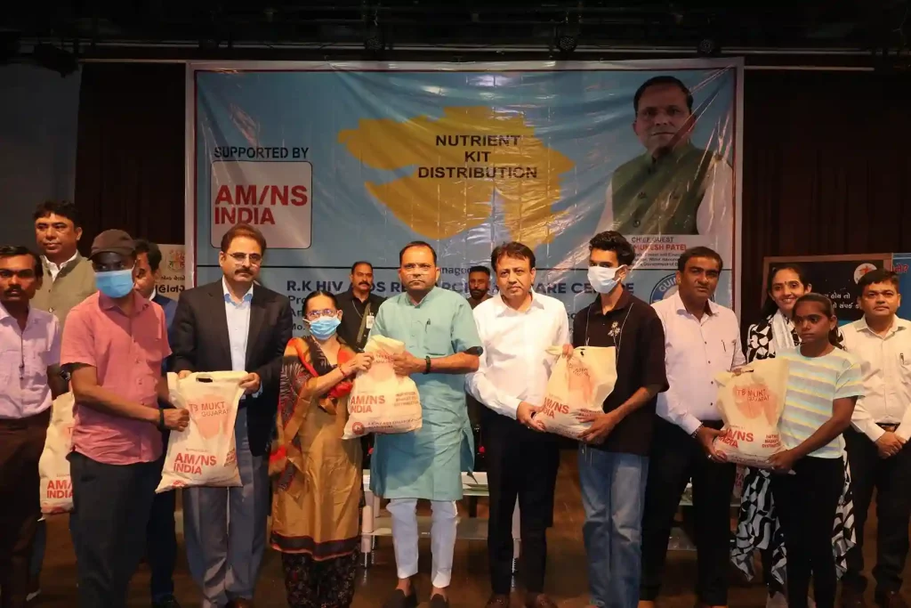 Distribution of nutritional kits to more than 300 TB patients by Minister of State for Forest, Environment Mukeshbhai Patel at Adajan