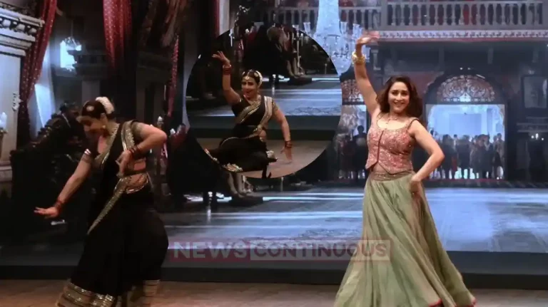 vidya balan fall down while she dance with madhuri dixit on am je tomar