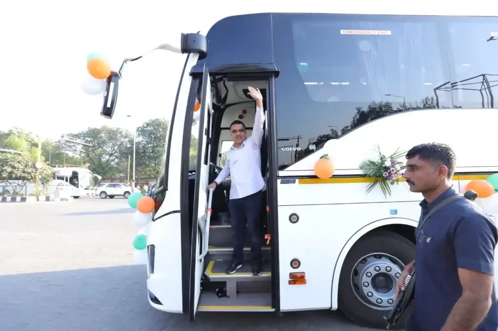 Harsh Sanghavi flagging off 10 new hi-tech Volvo buses to connect the cities of Gujarat with each other