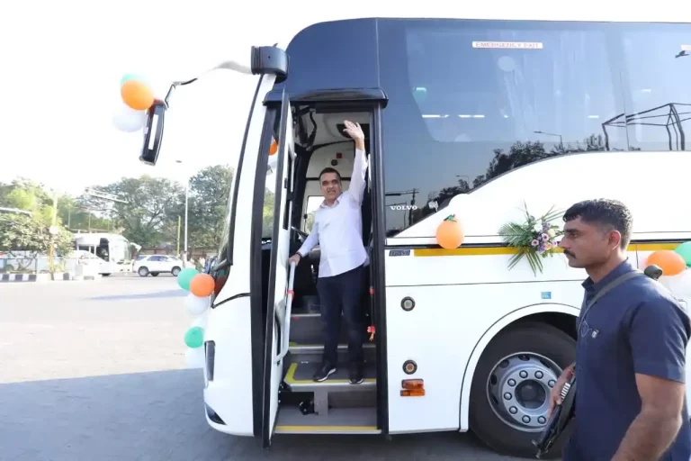 Harsh Sanghavi flagging off 10 new hi-tech Volvo buses to connect the cities of Gujarat with each other