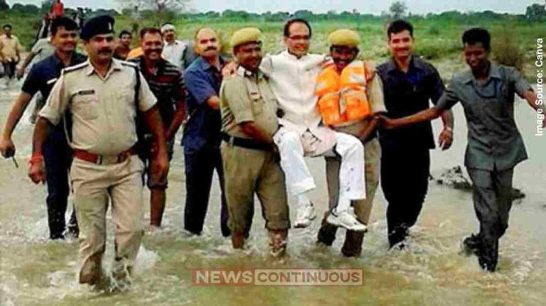 Congress MP બૂટ ભીના ન થાય તે માટે પૂર પીડિતના ખભા પર ચડી ગયા કોંગ્રેસના સાંસદ Congress MP બૂટ ભીના ન થાય તે માટે પૂર પીડિતના ખભા પર ચડી ગયા કોંગ્રેસના સાંસદ